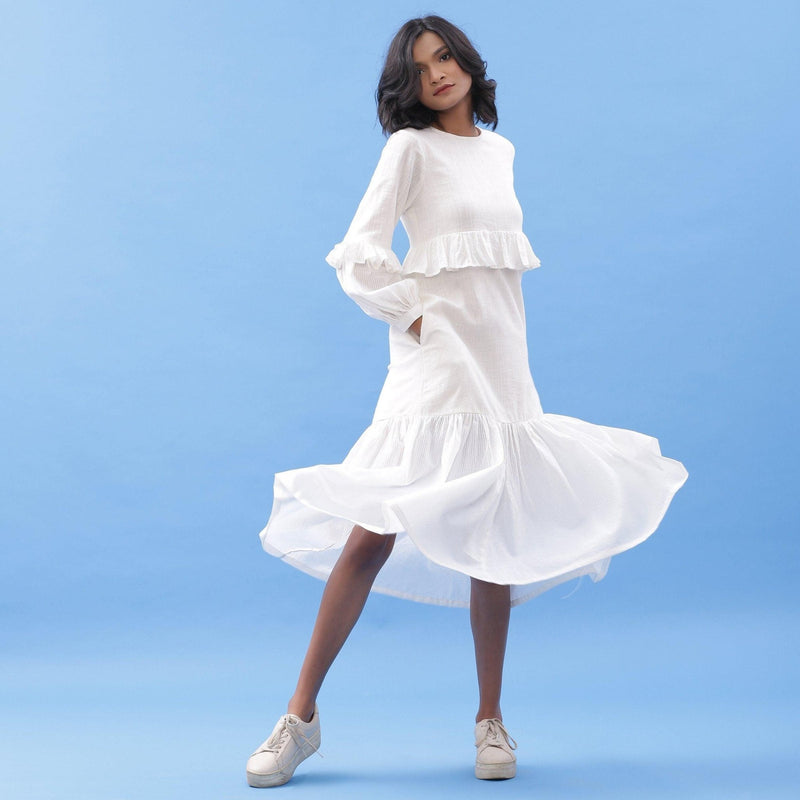 Front View of a Model wearing White Cotton Frilled Bohemian Tier Midi Dress