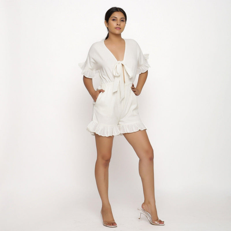 Front View of a Model wearing White Frilled Sleeve Cotton Playsuit