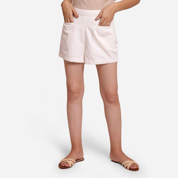 Front View of a Model wearing White Hand Beaded Short Cotton Shorts