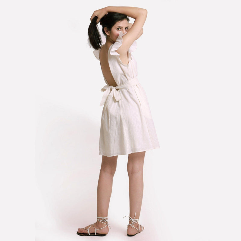 Back View of a Model wearing White Princess Line Backless Short Dress