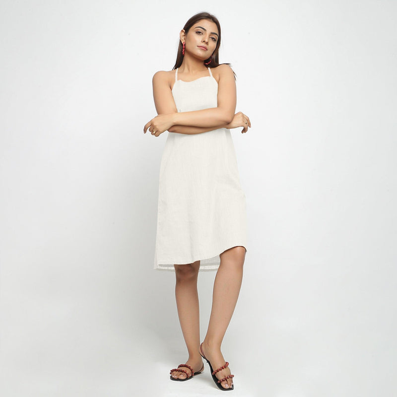 Front View of a Model wearing White Criss-Cross Cotton A-Line Dress