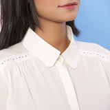 Front Detail of a Model wearing Organic Cotton Beaded Lace White Shirt