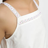 Front Detail of a Model wearing Hand Beaded Organic Cotton Camisole Top