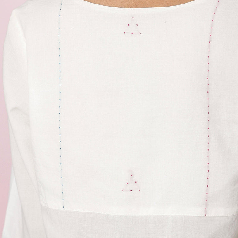 Front Detail of a Model wearing Organic Cotton Embroidered Split Neck Top