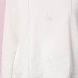 Front Detail of a Model wearing Organic Cotton Embroidered Split Neck Top