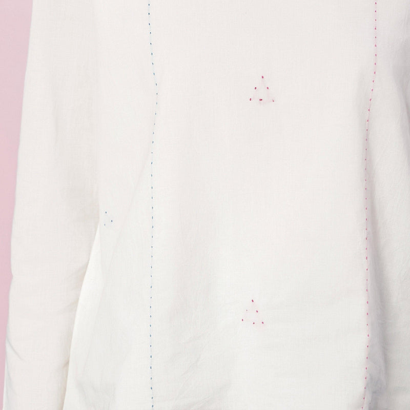 Front Detail of a Model wearing Organic Cotton Embroidered Split Neck Top