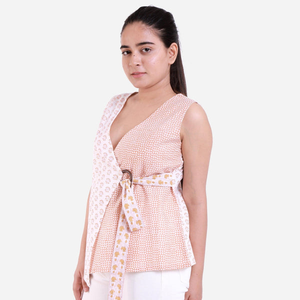 Left View of a Model wearing White Sanganeri Block Printed Cotton Sleeveless Wrap Top