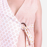 Front Detail of a Model wearing White Sanganeri Block Printed Cotton Sleeveless Wrap Top