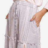 Front Detail of a Model wearing Maxi Tiered Slit Skirt