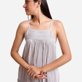 Front Detail of a Model wearing White Striped Cotton Knee Length Camisole Dress