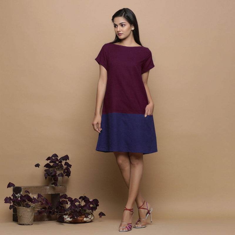 Front View of a Model wearing Wine and Navy Blue Handspun Cotton Paneled Boat Neck Shift Dress