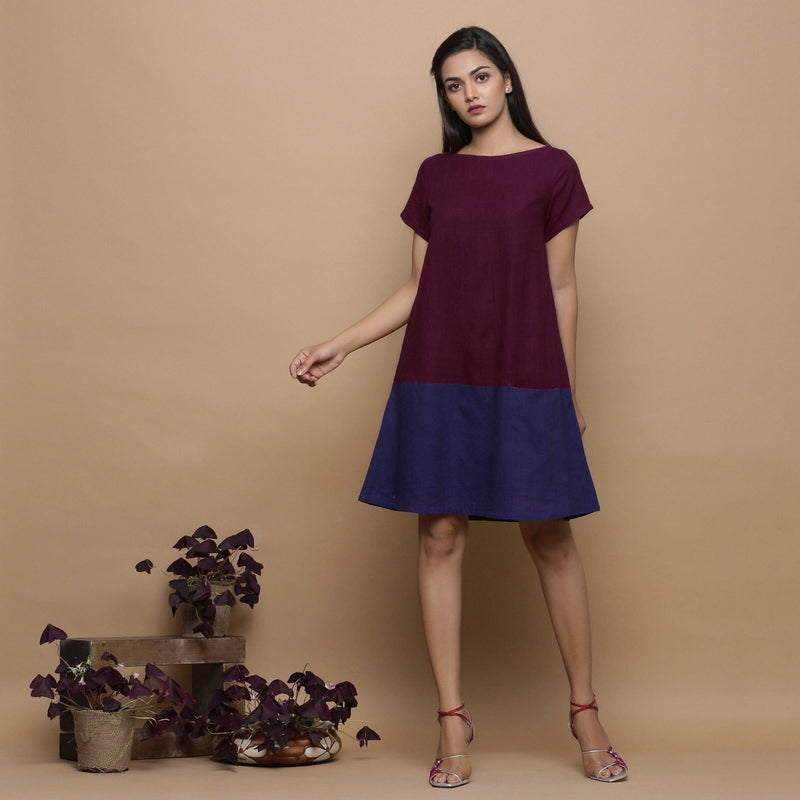 Front View of a Model wearing Wine and Navy Blue Handspun Cotton Paneled Boat Neck Shift Dress