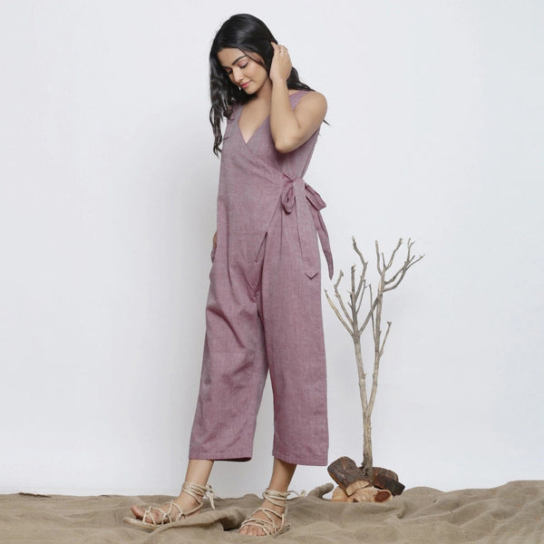 Left View of a Model wearing Wine Handspun Deep Neck Wrap Jumpsuit