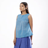 Left View of a Model wearing Handspun Sky Blue Yoked Top