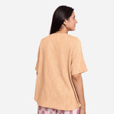 Back View of a Model wearing Yellow 100% Cotton High Low Tunic Top