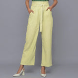 Front View of a Model wearing Yellow Pistachio Cotton Corduroy Pant