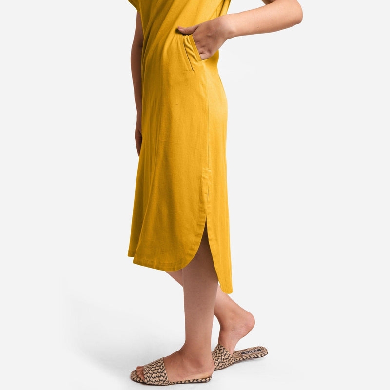 Left Detail of a Model wearing Yellow Cotton Welt Pocket Shift Dress