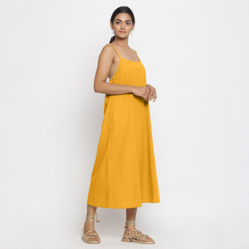 Right View of a Model wearing Yellow Cotton Flax Strap Sleeve A-Line Dress