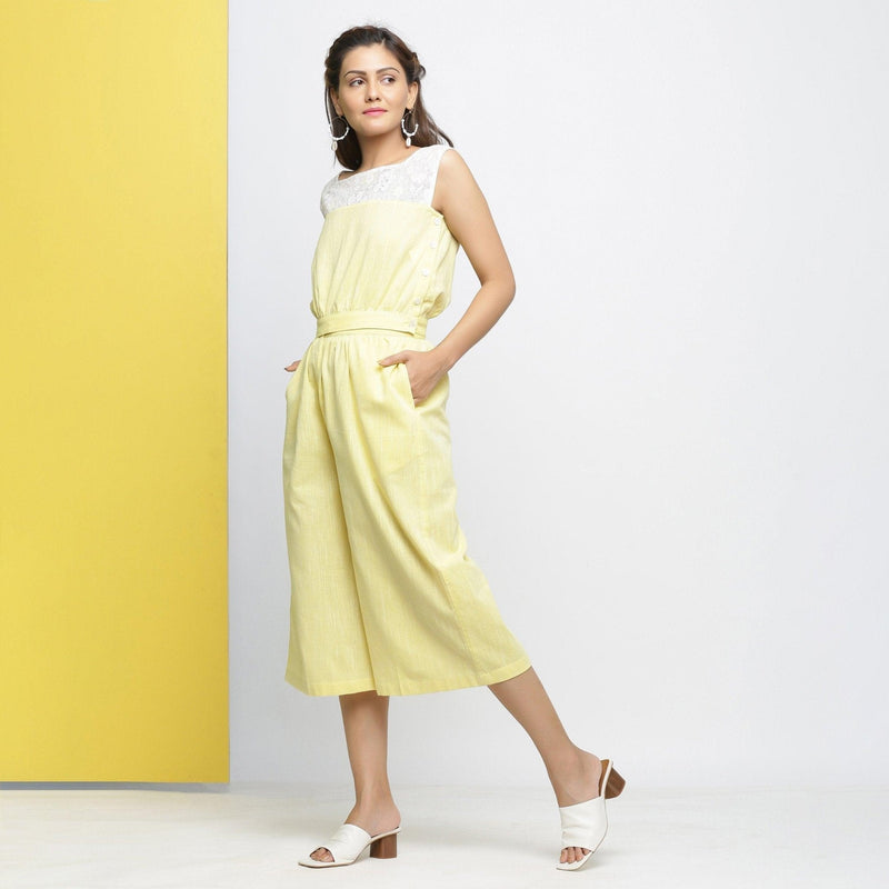 Left View of a Model wearing Yellow Cotton Lace Hand-Embroidered Crop Top