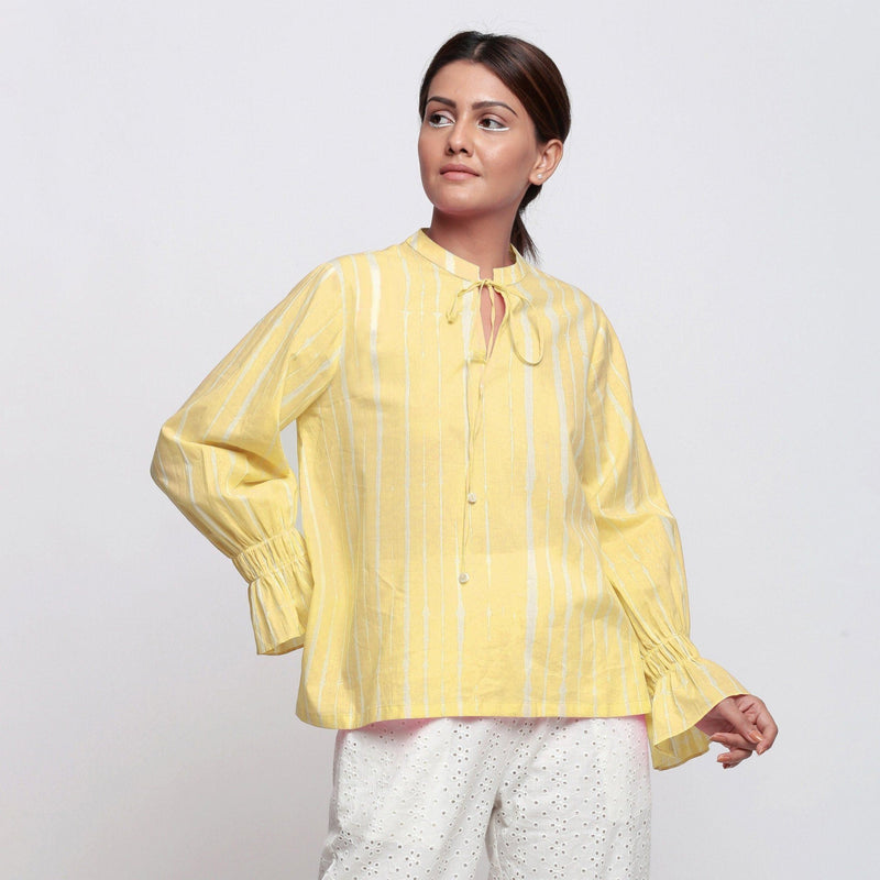 Front View of a Model wearing Yellow Hand Tie Dyed Shirred Blouson Top