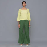 Front View of a Model wearing Yellow Pistachio Corduroy Bohemian Top