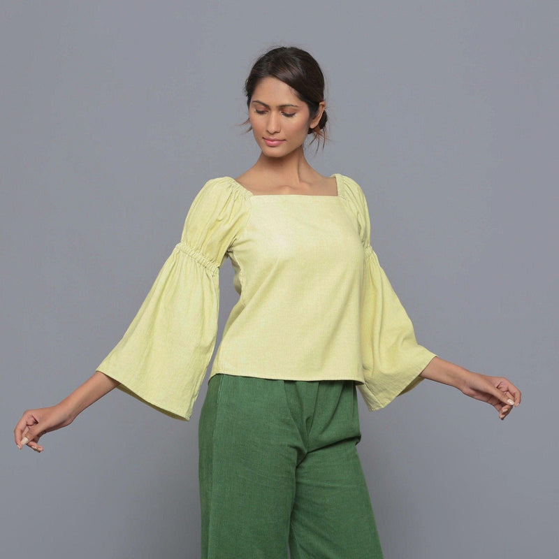 Front View of a Model wearing Yellow Pistachio Corduroy Bohemian Top