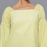 Front Detail of a Model wearing Yellow Pistachio Corduroy Bohemian Top