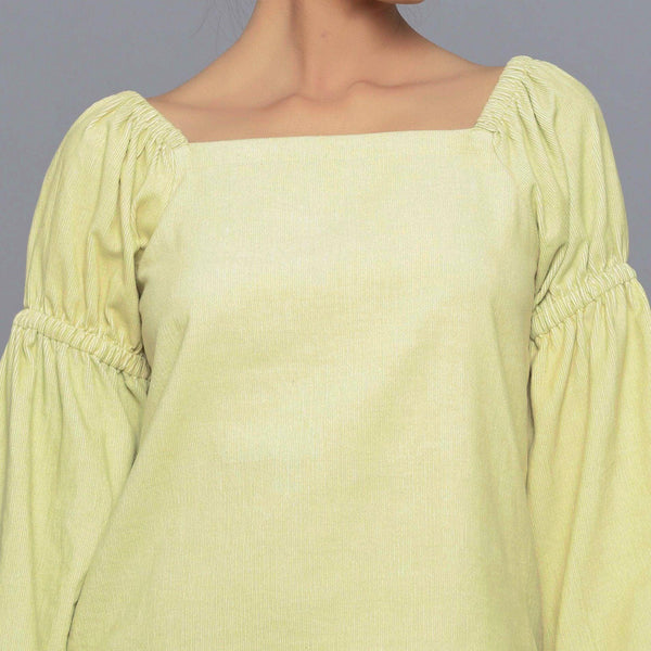 Front Detail of a Model wearing Yellow Pistachio Corduroy Bohemian Top