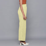 Right View of a Model wearing Yellow Pistachio Corduroy Striped Bootcut Pant