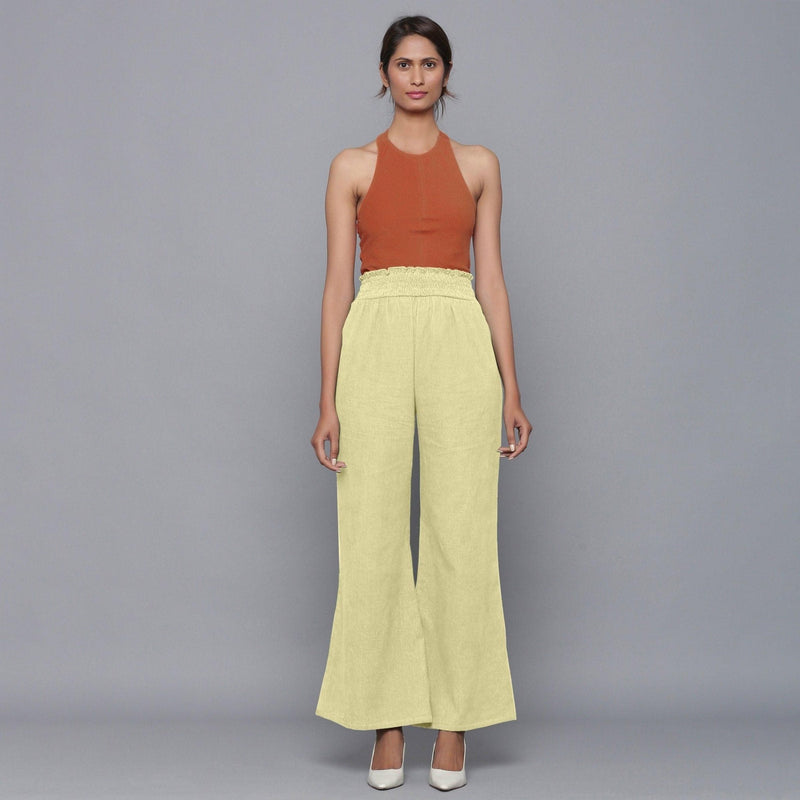 Front View of a Model wearing Yellow Pistachio Corduroy Striped Bootcut Pant