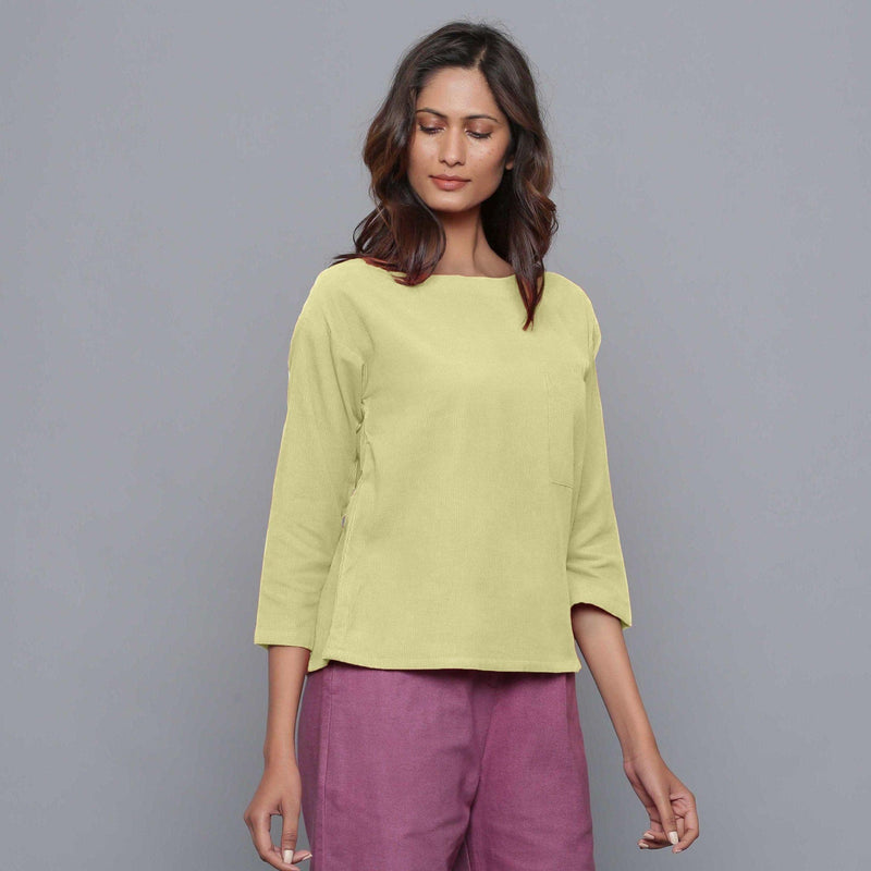 Front View of a Model wearing Yellow Pistachio Corduroy Drop Shoulder Top