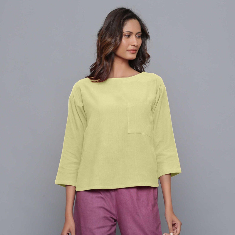 Front View of a Model wearing Yellow Pistachio Corduroy Drop Shoulder Top