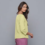 Left View of a Model wearing Yellow Pistachio Corduroy Drop Shoulder Top