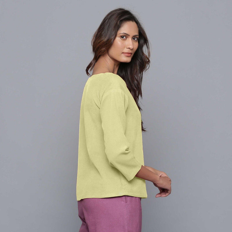 Left View of a Model wearing Yellow Pistachio Corduroy Drop Shoulder Top