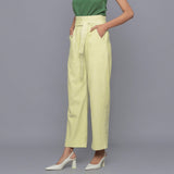 Left View of a Model wearing Yellow Pistachio Cotton Corduroy Pant