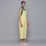 Right View of a Model wearing Yellow Pistachio Cotton Corduroy Dungaree