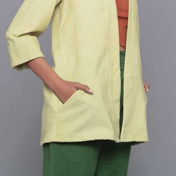 Front Detail of a Model wearing Pistachio Cotton Corduroy Shrug