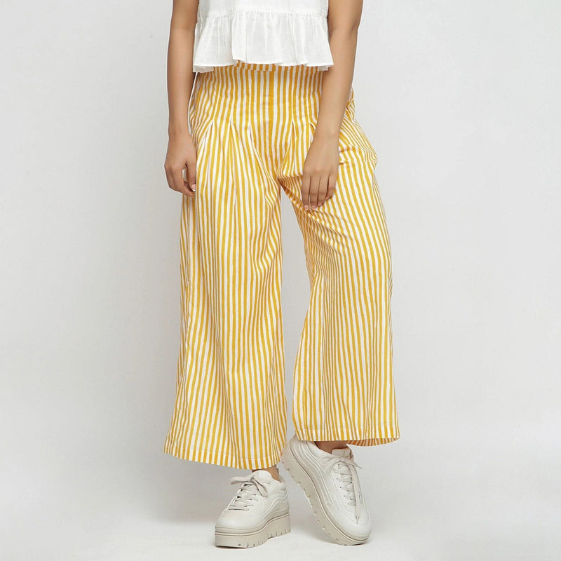 Front View of a Model wearing Yellow Striped Wide Legged Cotton Pant