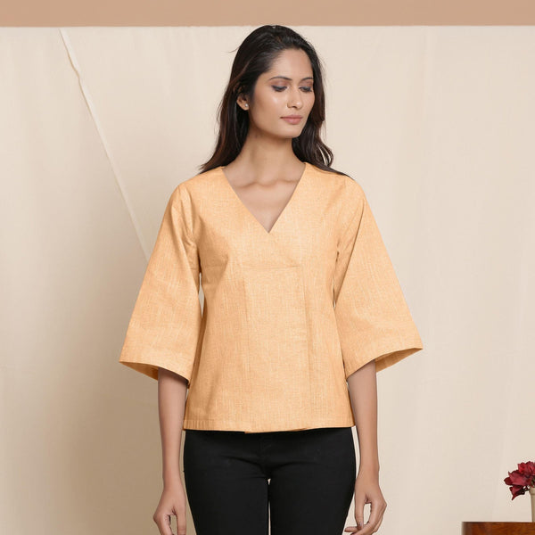 Front View of a Model wearing Yellow Comfy Straight Top