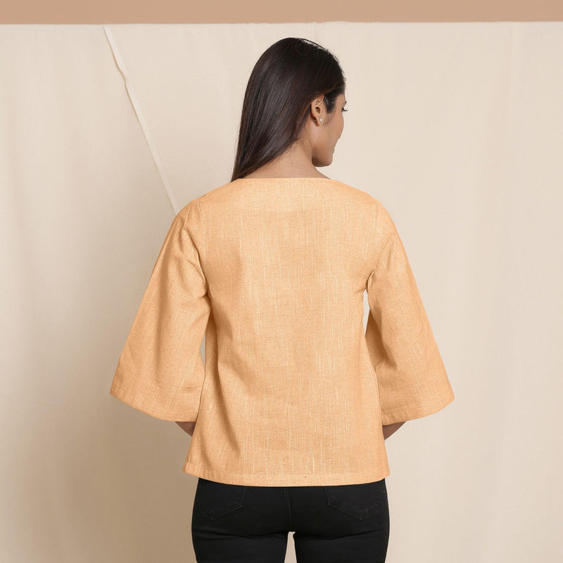 Back View of a Model wearing Yellow Comfy Straight Top