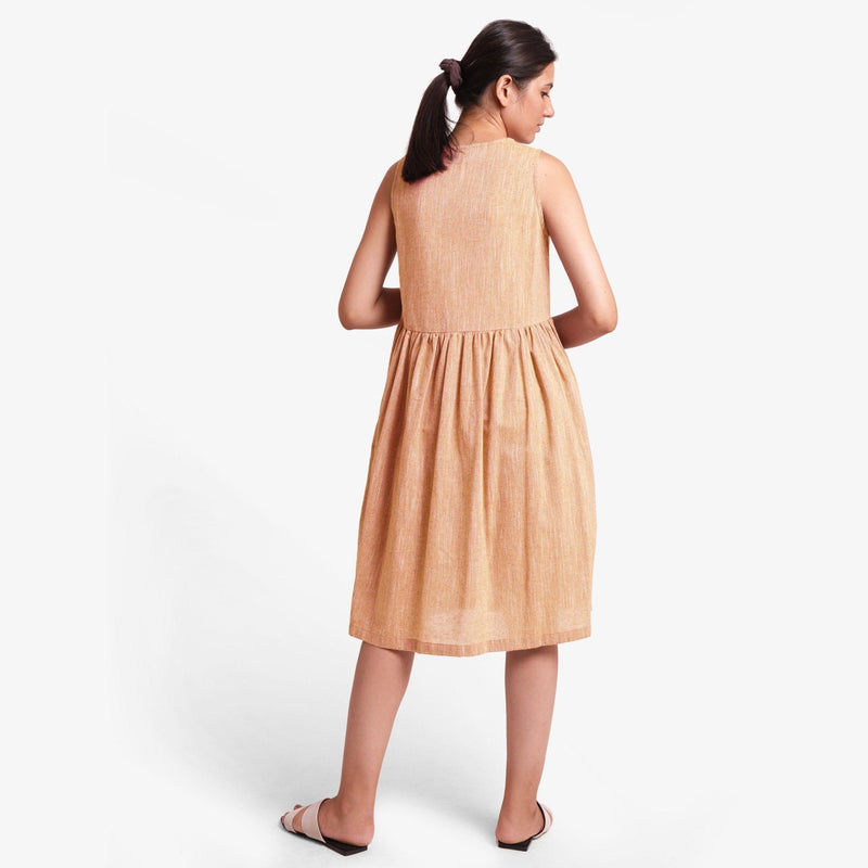 Back View of a Model wearing Yarn Dyed Cotton Yellow Yoke Dress