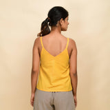 Back View of a Model wearing Yellow 100% Cotton Relaxed Fit Spaghetti Top