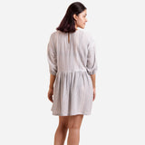 Back View of a Model wearing Yarn Dyed Crinkled Cotton Gathered Dress