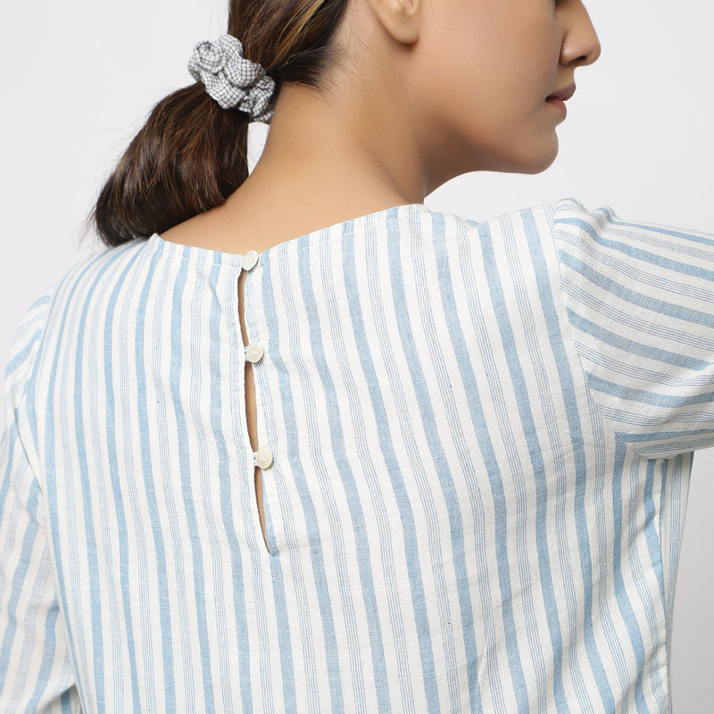 Back Detail of a Model wearing Off-White Handspun Cotton Muslin Dress