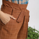 Right Detail of a Model wearing Almond Brown Handspun Paperbag Shorts