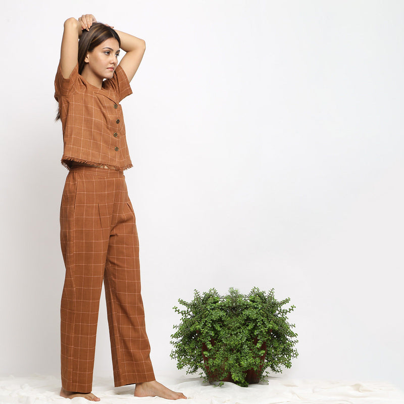 Right View of a Model wearing Almond Brown Handspun Check Pant