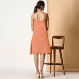 Back View of a Model wearing Apricot Cotton Flax Strappy Slit Dress