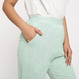 Front Detail of a Model wearing Aqua Yarn Dyed Mid Rise Tapered Pant