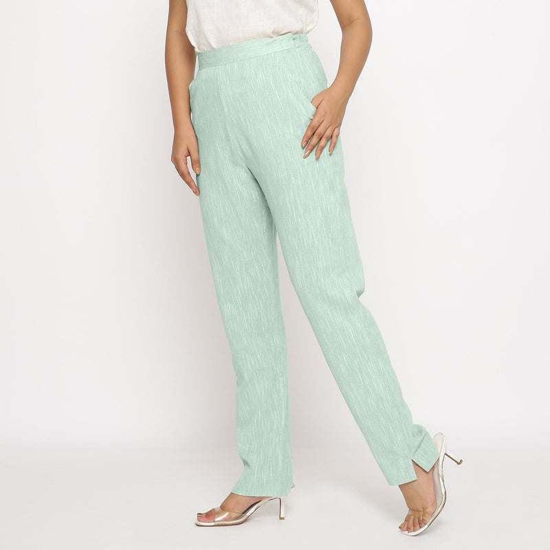 Left View of a Model wearing Aqua Yarn Dyed Mid Rise Tapered Pant