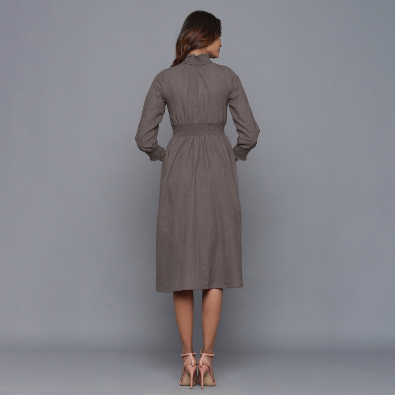 Back View of a Model wearing Ash Grey Flannel High Neck Midi Dress